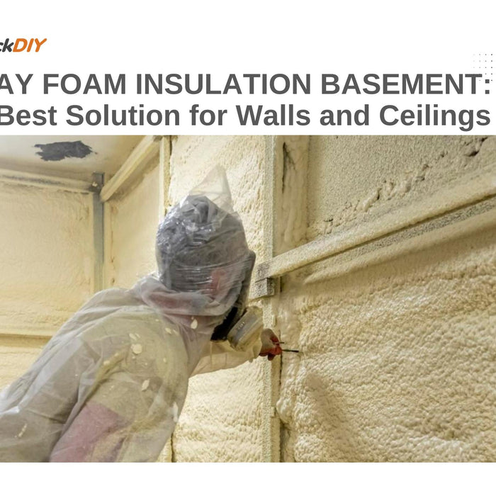 Worker applying closed-cell spray foam insulation on basement walls.